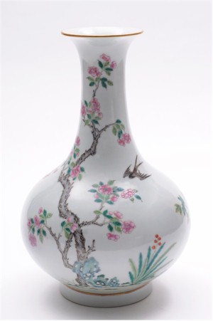 A Chinese porcelain famille rose bottle (FS13/346), which was hotly contested over in the saleroom, sold for £80,000.